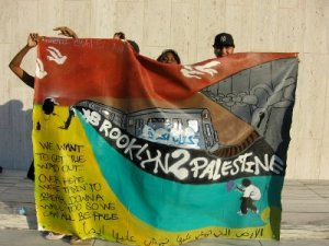Students participating in the Palestine Education Project (PEP) program in Brooklynholding up their latest creation, 2008
