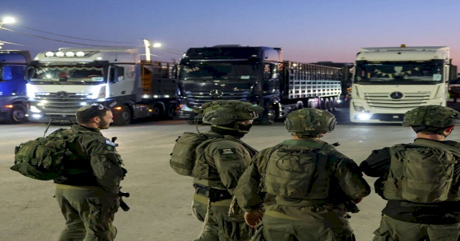 عسكرة توزيع المساعدات في غزة: مأسسة تسليح المساعدات وإعادة ترسيخ الوجود العسكري الإسرائيلي