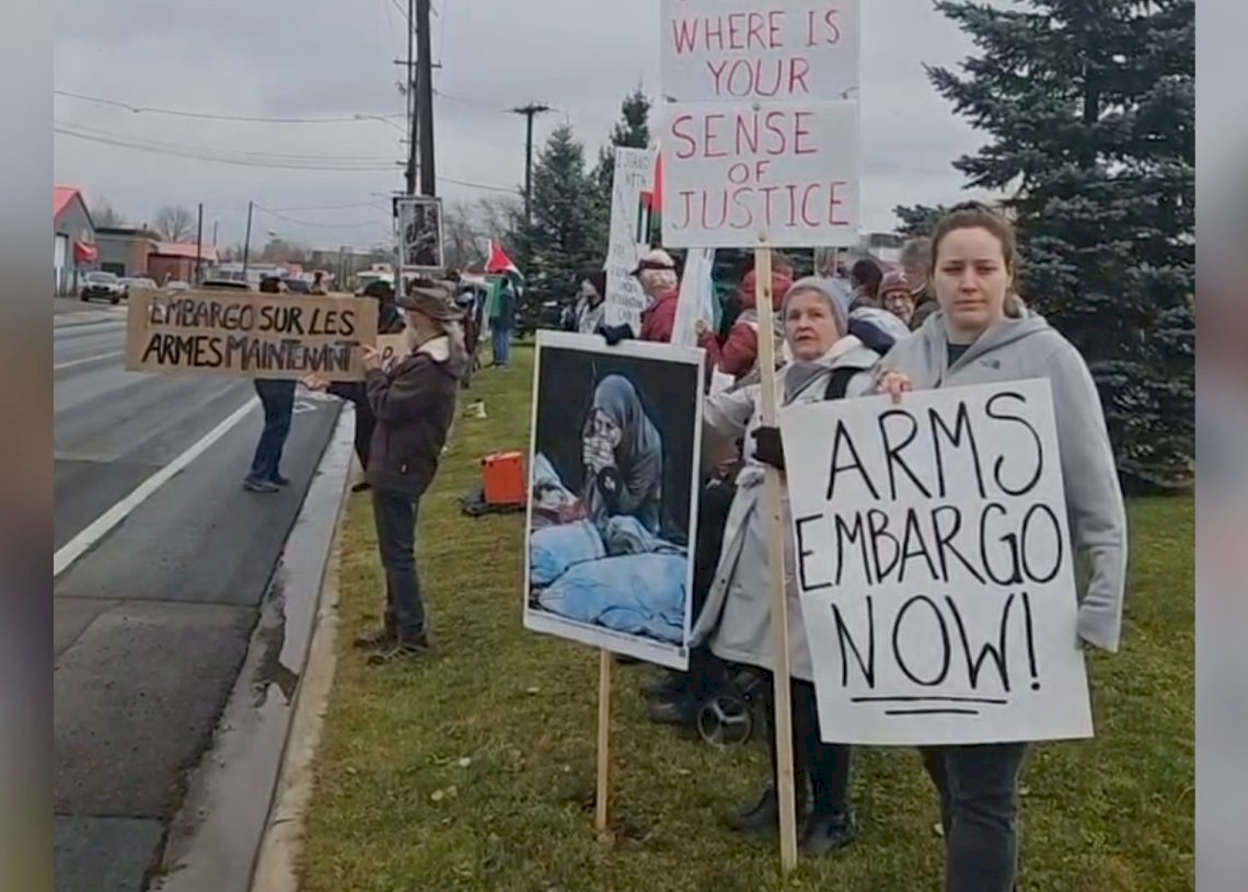 Protesters demanding an arms embargo against Israel rallied on Saturday, Nov. 16, 2024, outside of Apex Industries on Millennium Boulevard in Moncton.